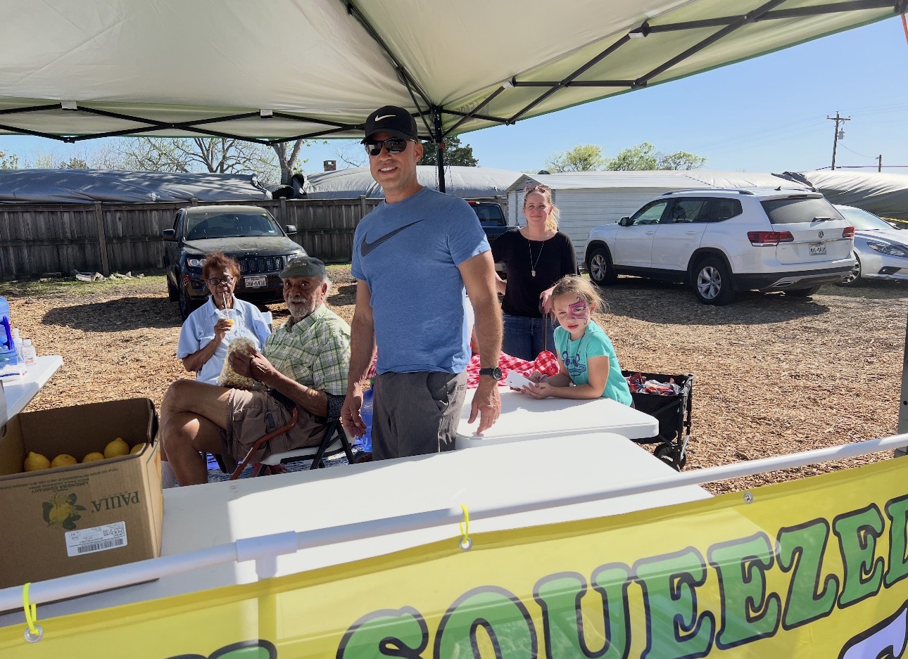 Family at the lemonade stand